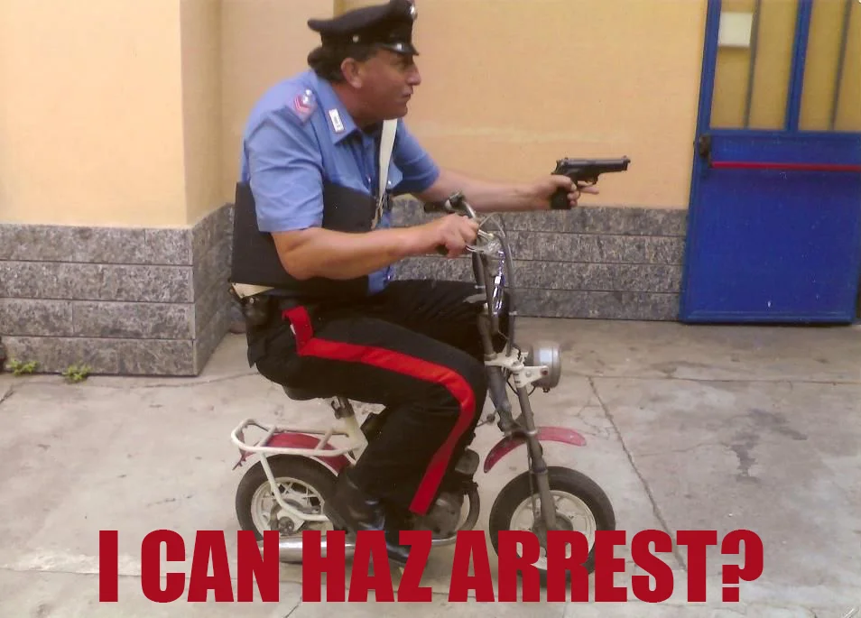 cop on bike I can haz arrest.jpg