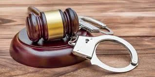 gavelhandcuffs.webp
