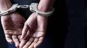 womanhandcuffed.webp
